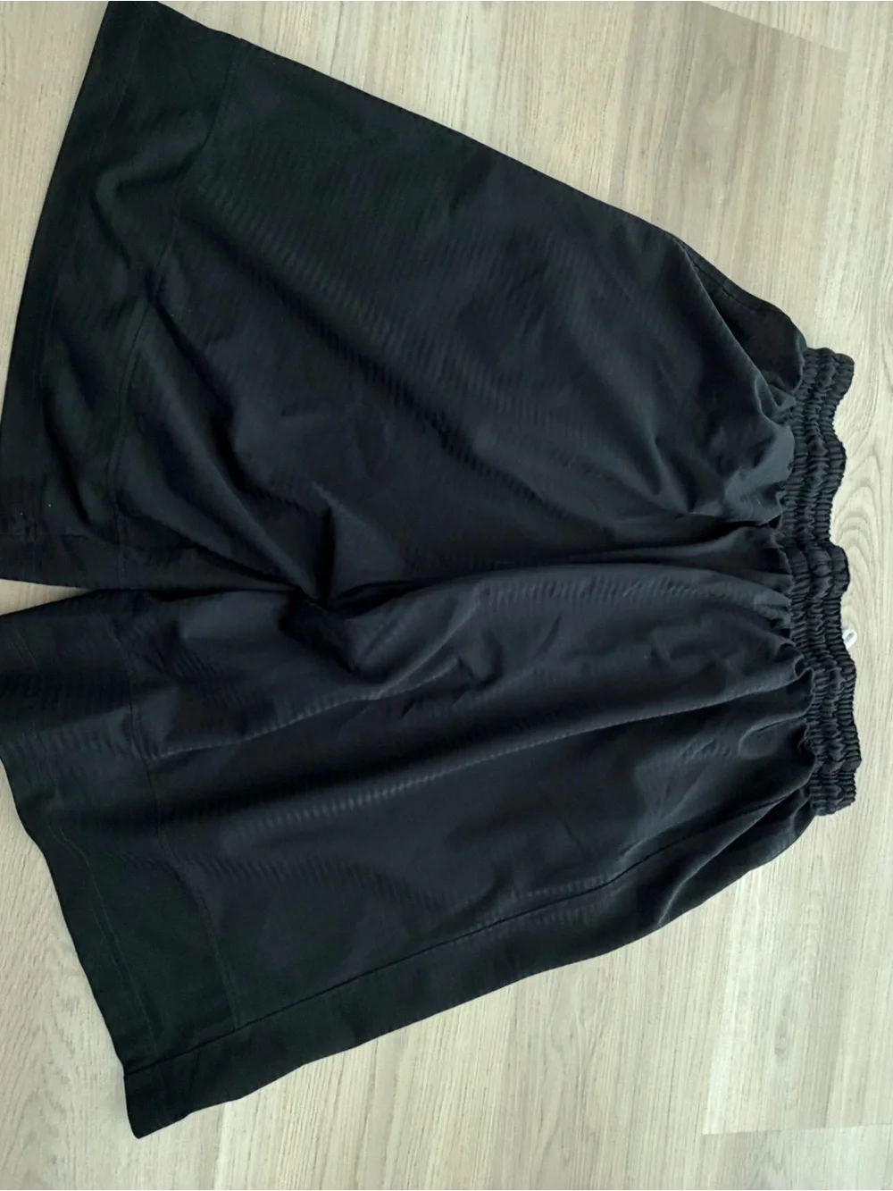 Nike Black Shorts with White Swoosh Logo